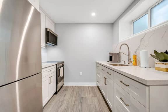 *Minutes to BMO Field* 3BR Home in Downtown - Image 3
